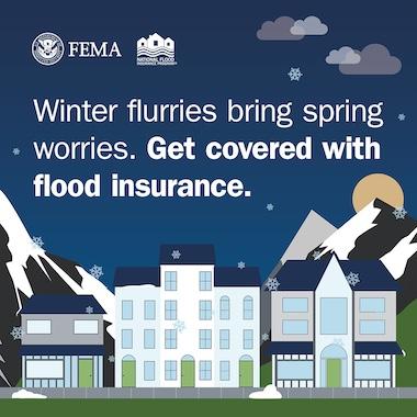 City center during snow storm, with snowy mountains in the background. Text: Winter flurries bring spring worries. Get covered with flood insurance