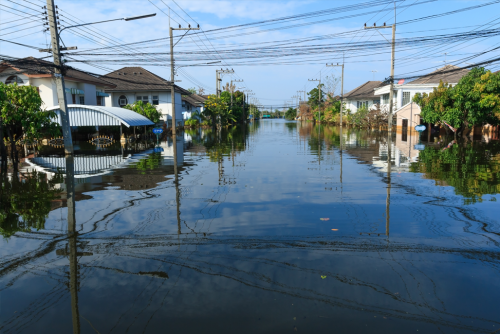 View down a flooded suburban street