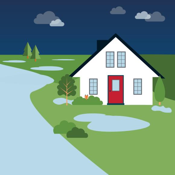 Rural house next to flooding river
